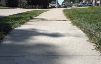 Sunken sidewalk raised with PolyLevel® Sunken sidewalk raised with PolyLevel®