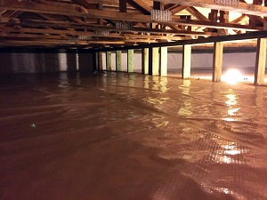 Crawl space repaired with vapor barrier Crawl space encapsulation & repair system