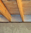SilverGlo™ insulation installed in a floor joist in Garden Grove