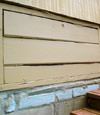 an old-fashioned crawl space door in Torrance about to be replaced