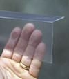 Closeup of a clear plastic covering on a Corona crawl space block wall